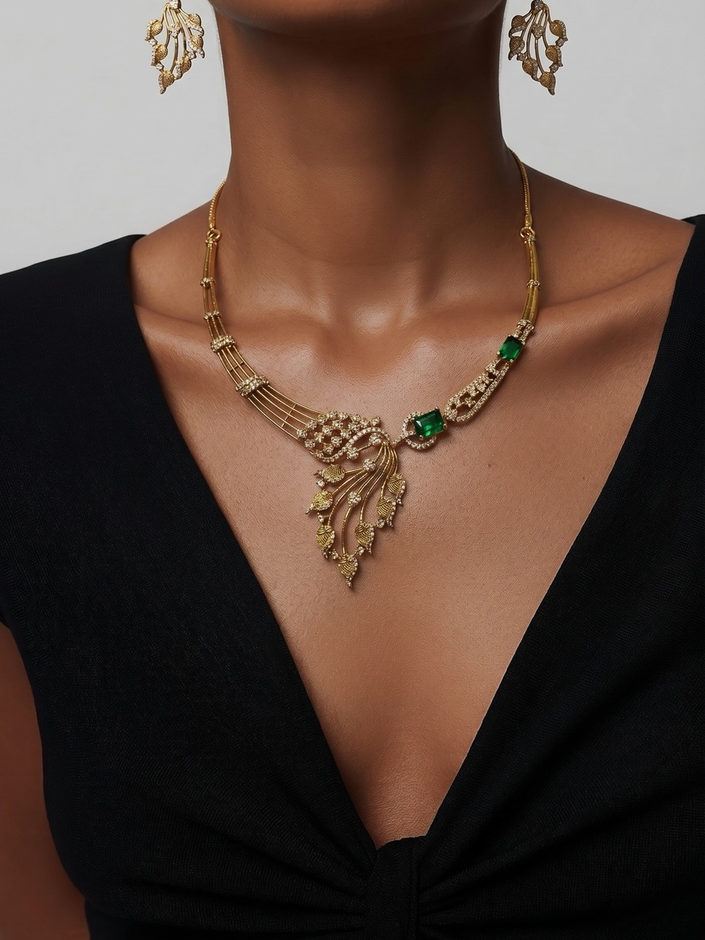 Antique Gold tone with Emerald color Stones set